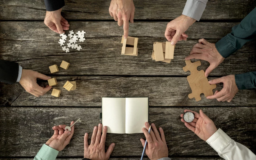 Eight businessmen planning a strategy in business advancement
